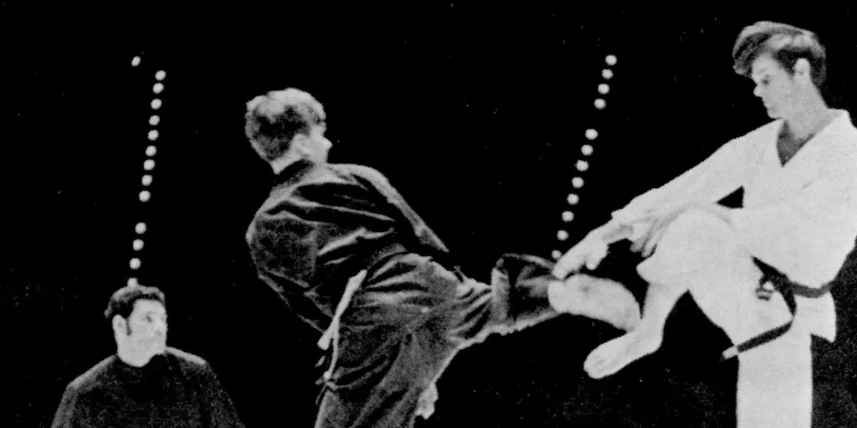 Karate match with three participants